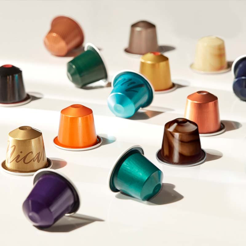 Pack 50 cápsulas tipo doméstico, azúcar, edulcorante, paletinas, 50 vasos de cartón y leche y agua